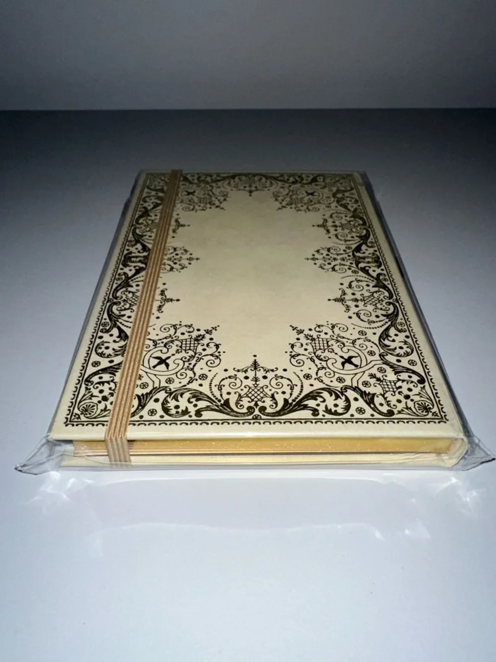 Gilded Ivory gold-foiled embossed cover gilded pages elastic closure journal